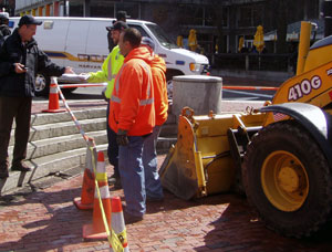 DPW Sidewalk crew discuss work to be done